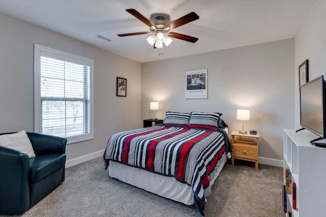 bedroom with ceiling fan and carpet floors