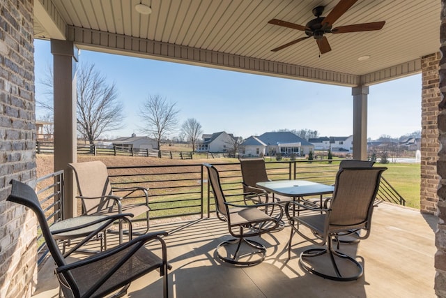 view of patio with ceiling fan