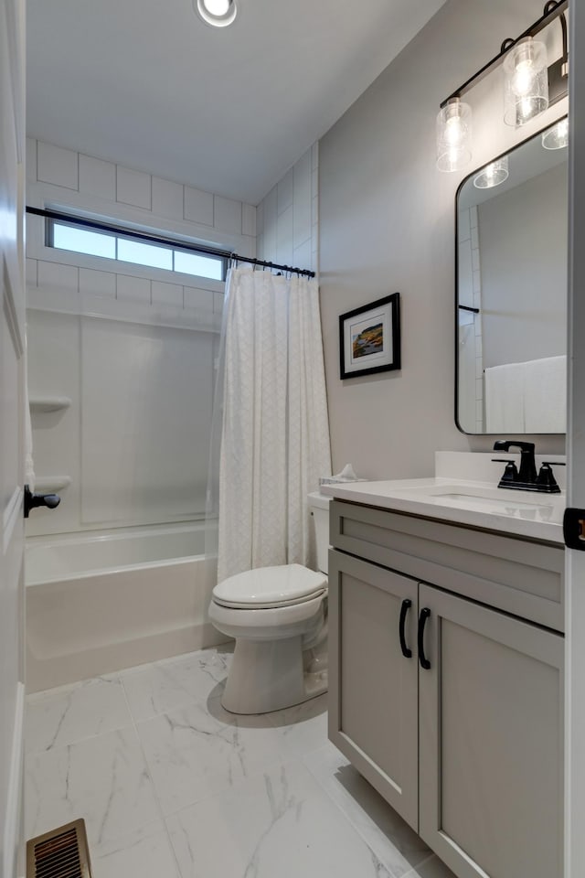 full bathroom featuring toilet, vanity, and shower / bath combo with shower curtain