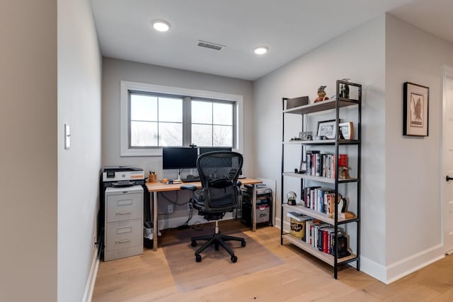 office space featuring light hardwood / wood-style flooring