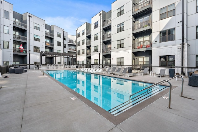 view of pool featuring a patio