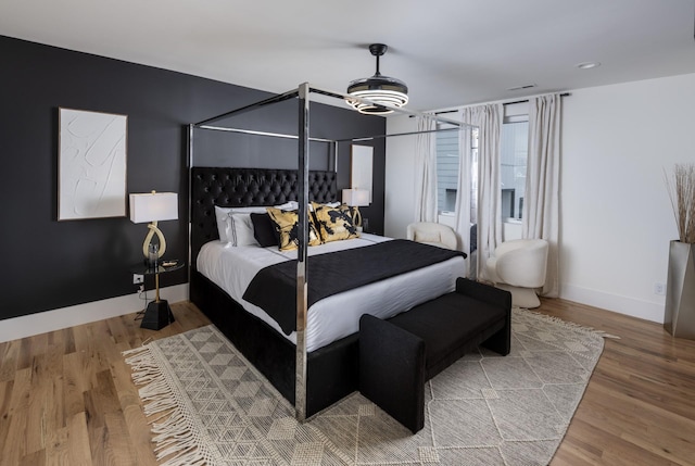 bedroom with wood-type flooring