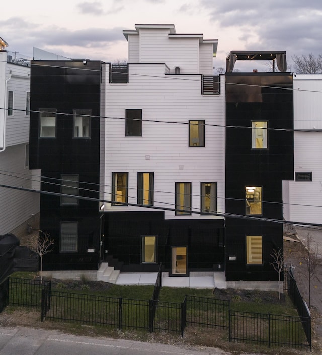 view of property with a fenced front yard