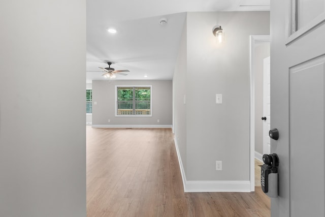 corridor featuring light hardwood / wood-style flooring