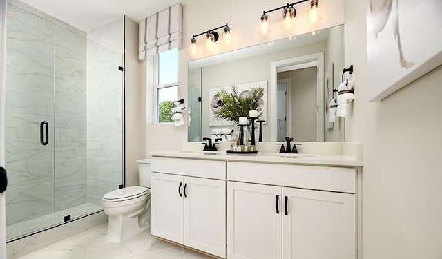 bathroom with toilet, a shower with shower door, and vanity