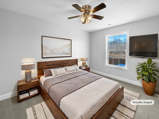 bedroom with ceiling fan and carpet