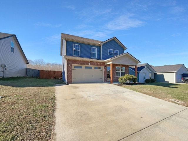 view of front of home with a front lawn and a garage