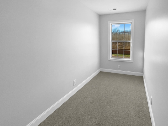 unfurnished room featuring carpet flooring