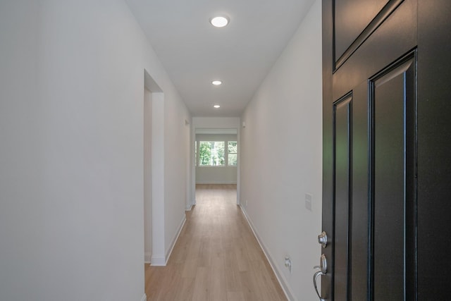 hallway featuring light wood-type flooring