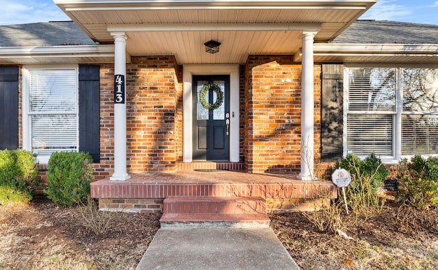 doorway to property featuring a porch