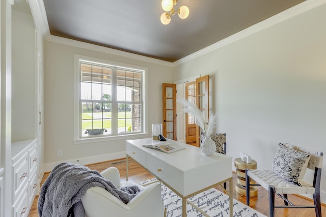 office featuring ornamental molding, light wood-type flooring, and a chandelier