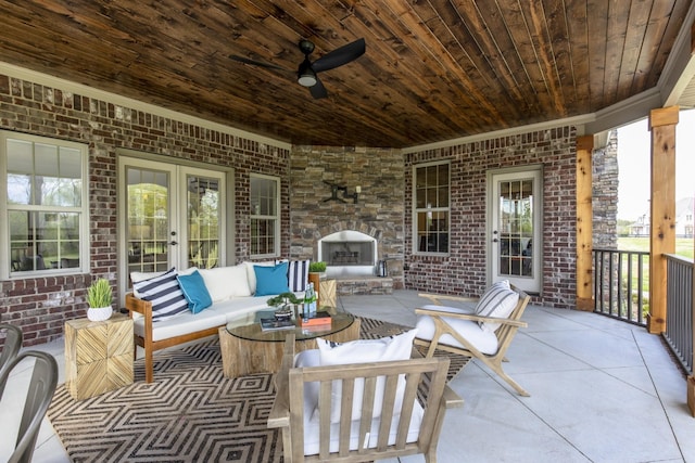 view of patio featuring french doors, ceiling fan, and outdoor lounge area