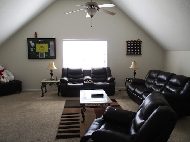 carpeted living room with ceiling fan and lofted ceiling