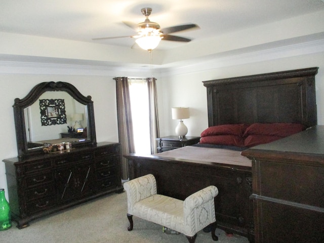 bedroom featuring ceiling fan and light colored carpet