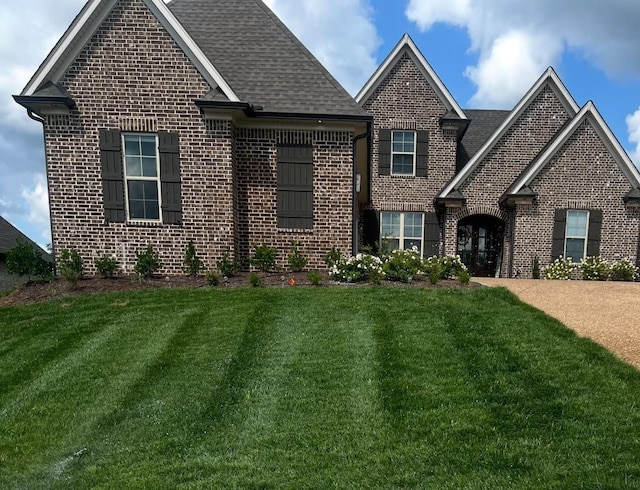 view of front of home with a front yard