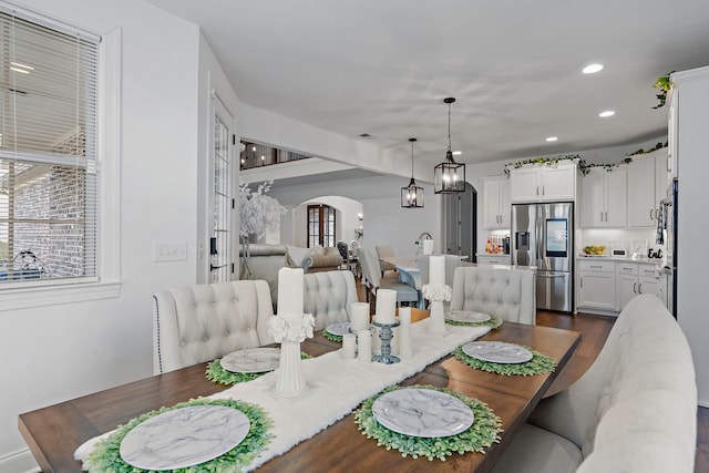 dining room with dark hardwood / wood-style floors