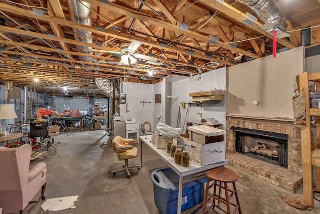 basement with a brick fireplace