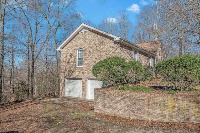 view of home's exterior featuring a garage