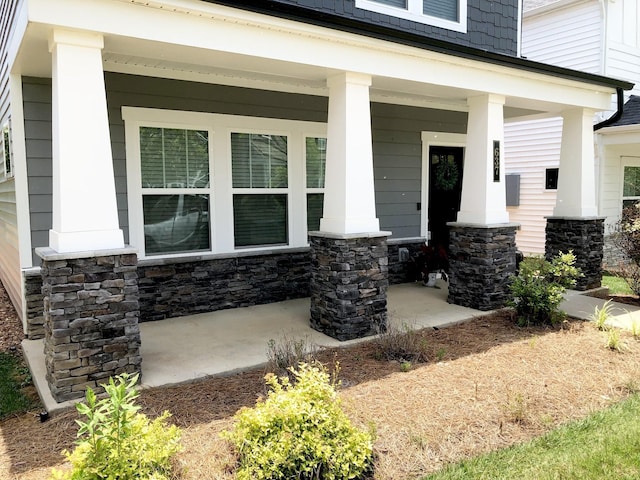 property entrance with a porch