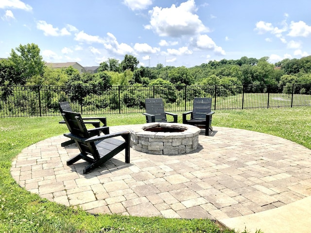 view of patio with a fire pit