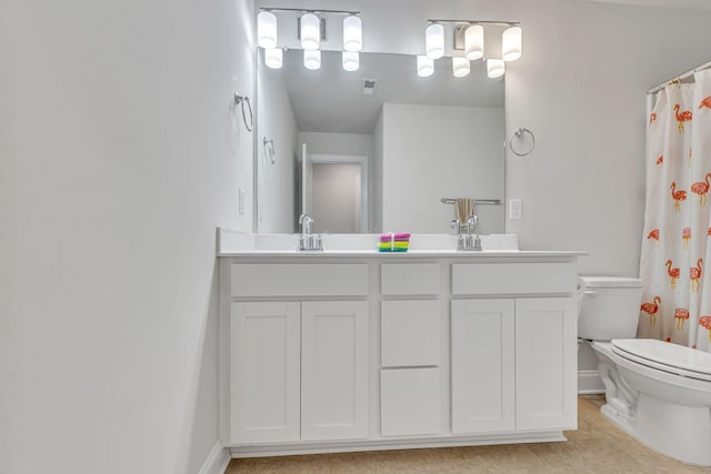 bathroom featuring walk in shower, tile patterned flooring, vanity, and toilet