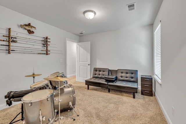 living area with carpet flooring