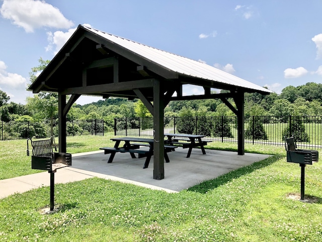 view of home's community featuring a gazebo, a patio area, and a yard