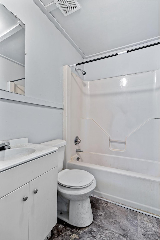 full bathroom featuring toilet, vanity, and bathtub / shower combination