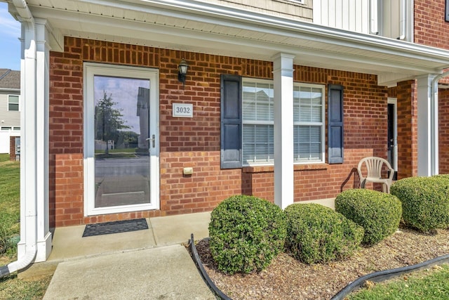 entrance to property with covered porch