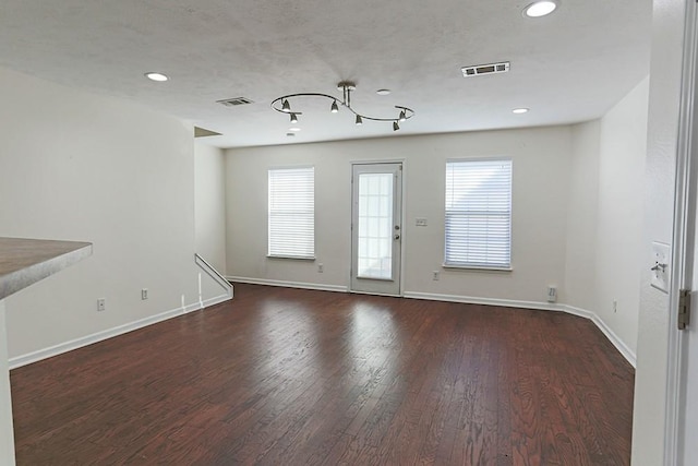 interior space with dark hardwood / wood-style floors