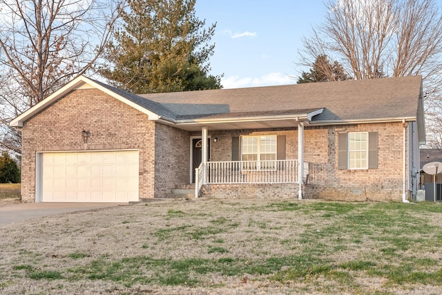 single story home with covered porch and a garage