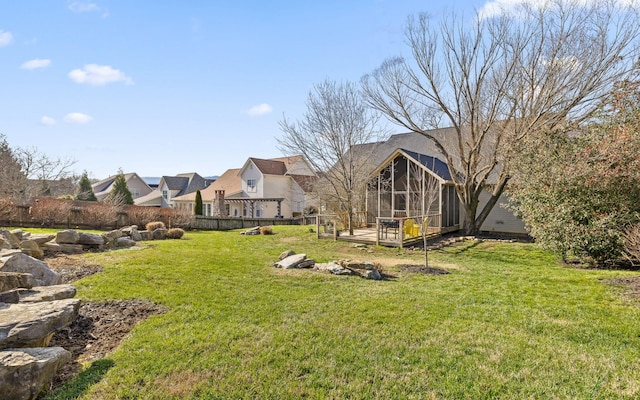 view of yard with a deck