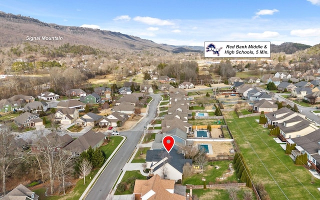 drone / aerial view featuring a mountain view