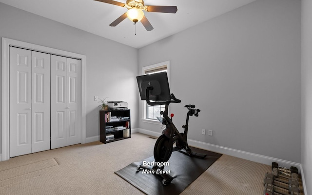 exercise room featuring carpet flooring and ceiling fan