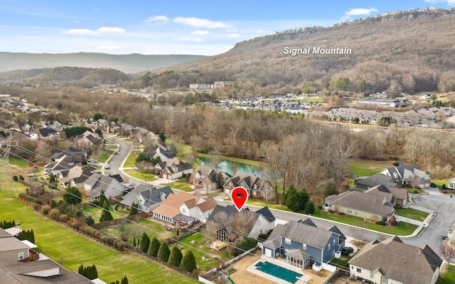 bird's eye view featuring a water and mountain view