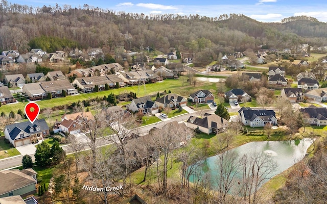 drone / aerial view with a water view