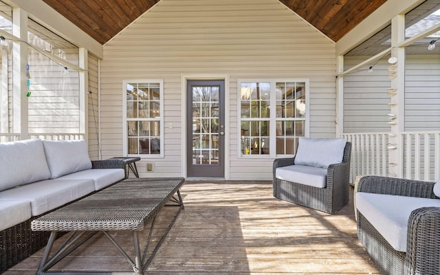 wooden deck with an outdoor hangout area