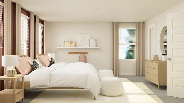 bedroom with light colored carpet and multiple windows