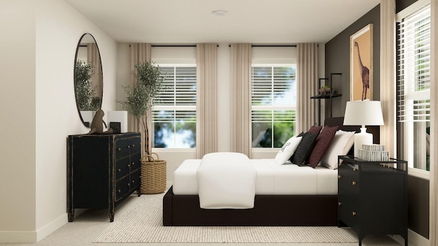 carpeted bedroom with multiple windows