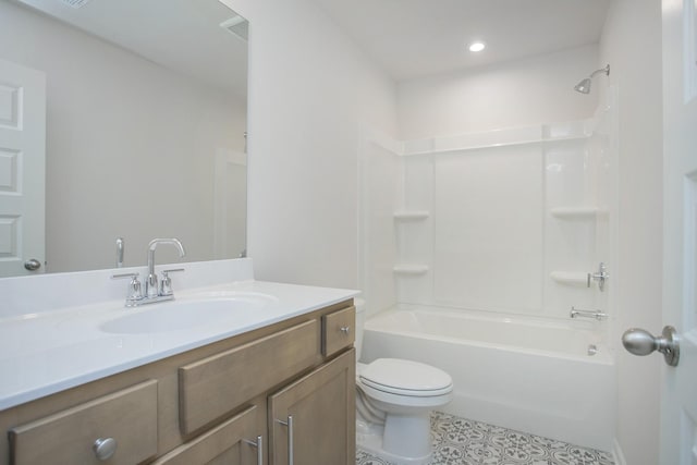 full bathroom with shower / tub combination, tile patterned floors, toilet, and vanity