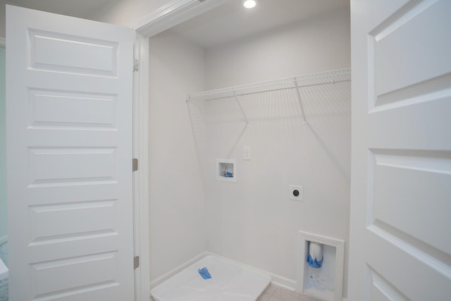 clothes washing area featuring hookup for an electric dryer and washer hookup