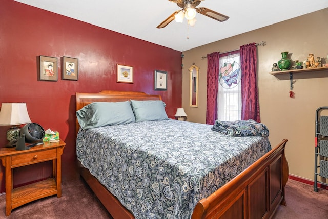 bedroom featuring ceiling fan and dark colored carpet