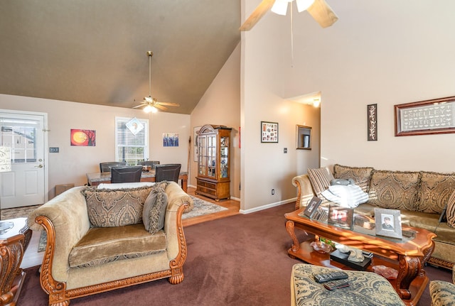 living room featuring high vaulted ceiling, dark colored carpet, and ceiling fan