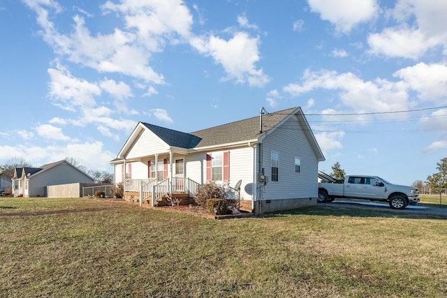 view of front of property with a porch and a front lawn