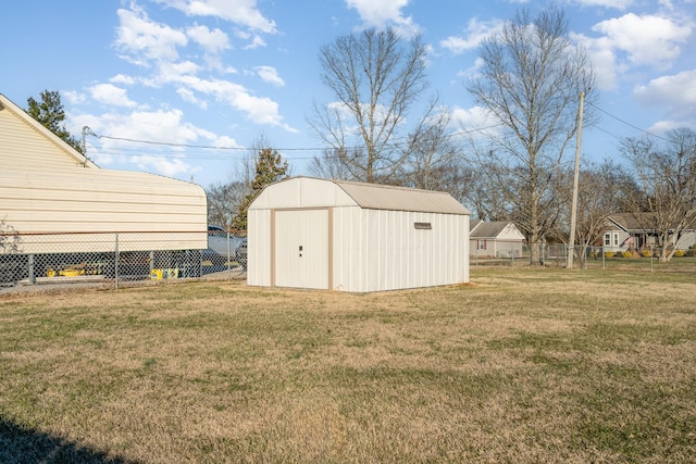 view of outdoor structure with a yard