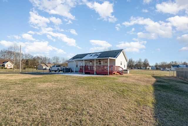 view of yard with a wooden deck