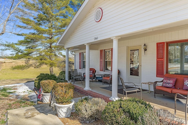 doorway to property with a porch