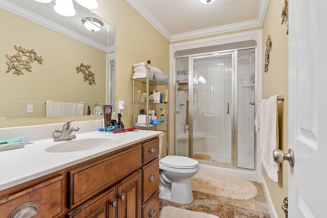 bathroom featuring toilet, a shower with door, crown molding, and vanity