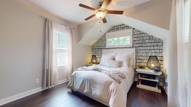 bedroom featuring lofted ceiling, ceiling fan, and dark hardwood / wood-style floors