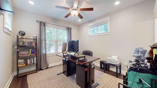 office with ceiling fan and dark hardwood / wood-style floors